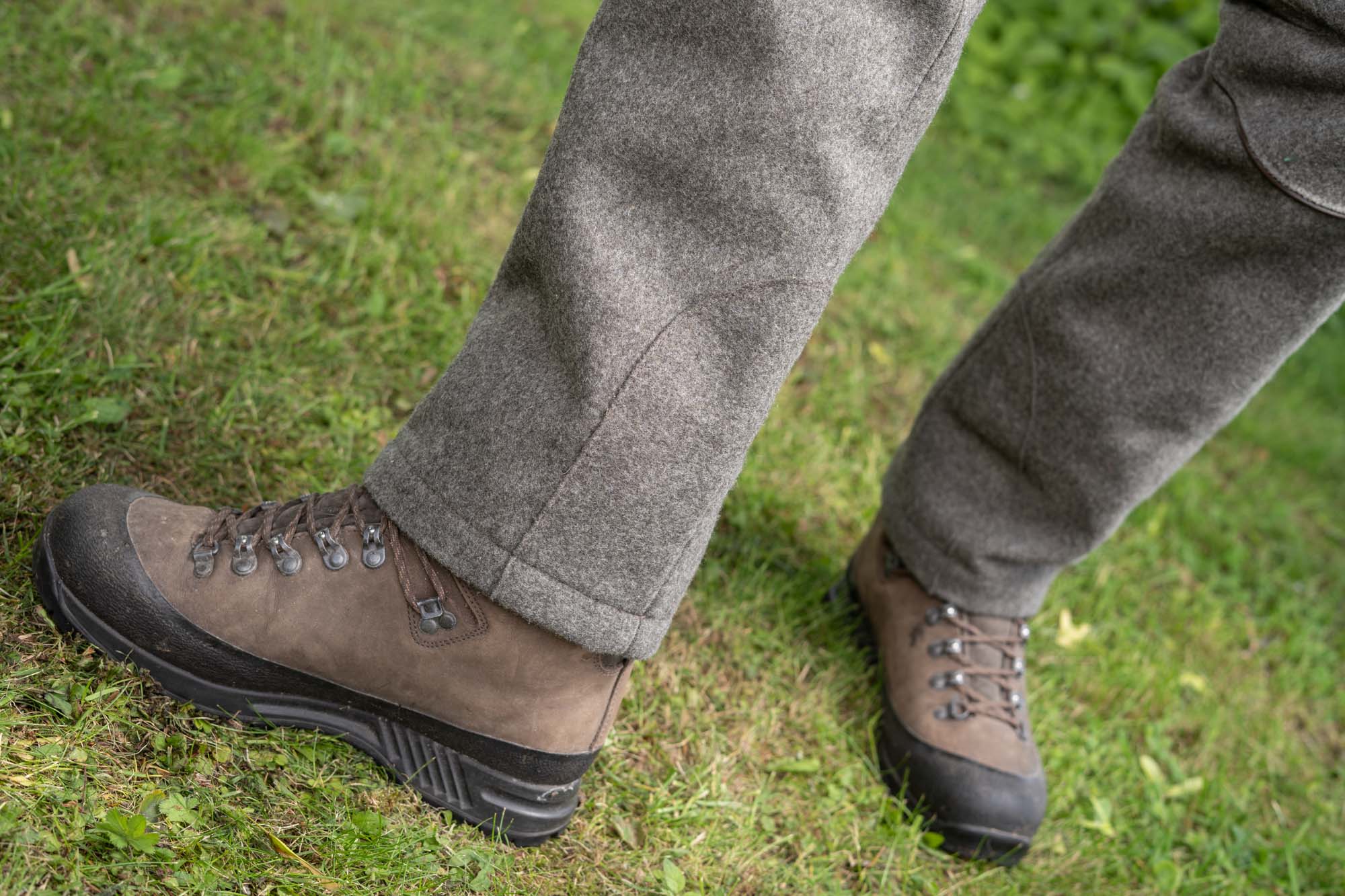 Reinforced lower legs of the Hamra Professional pants over hiking boots