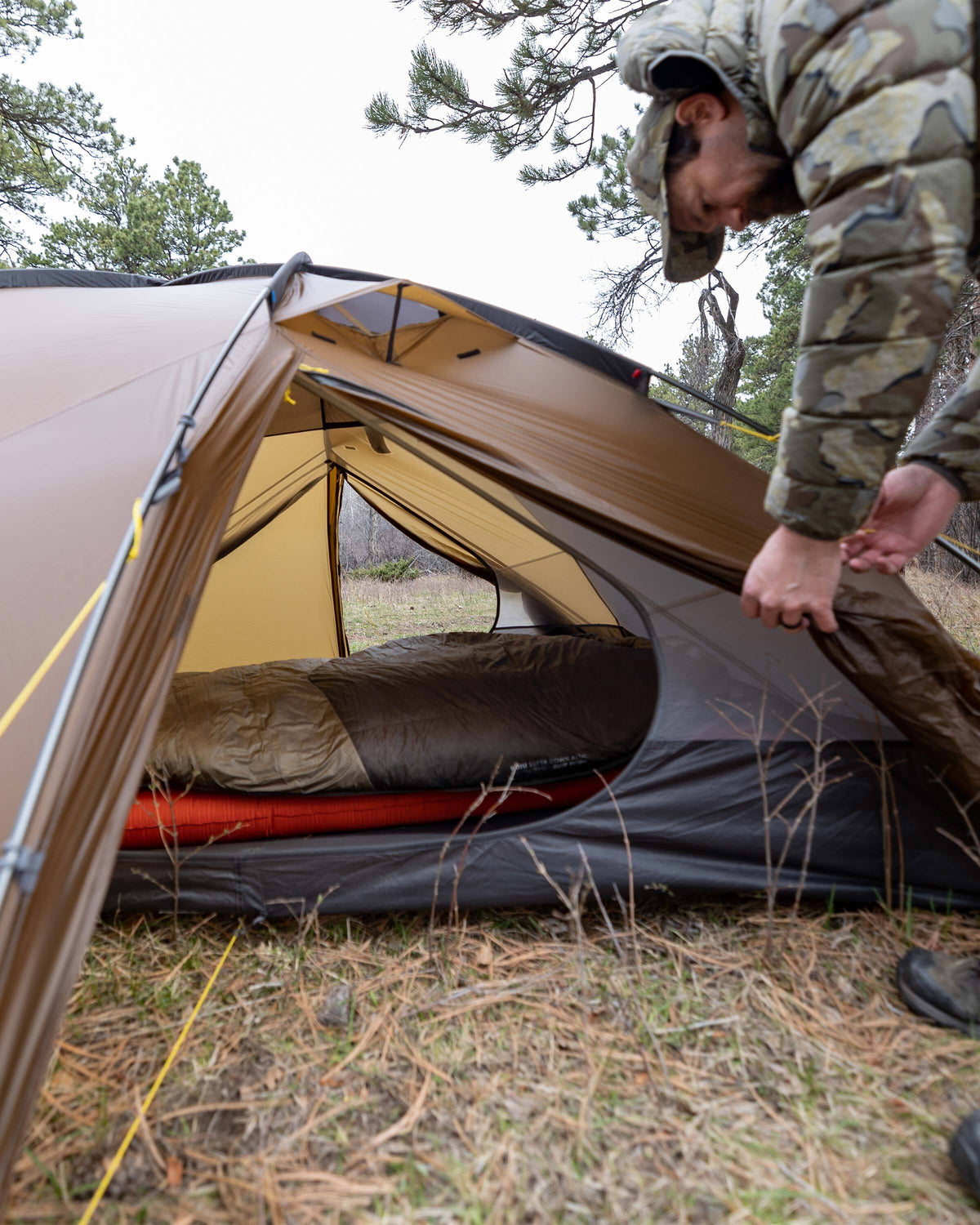 Open vestibule on the KUIU Mountain Star 3P showing the camel-colored fly