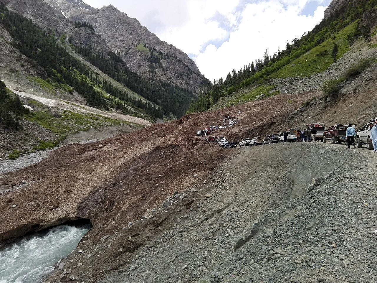 Glacial meltwater stream running below a mountain glacier