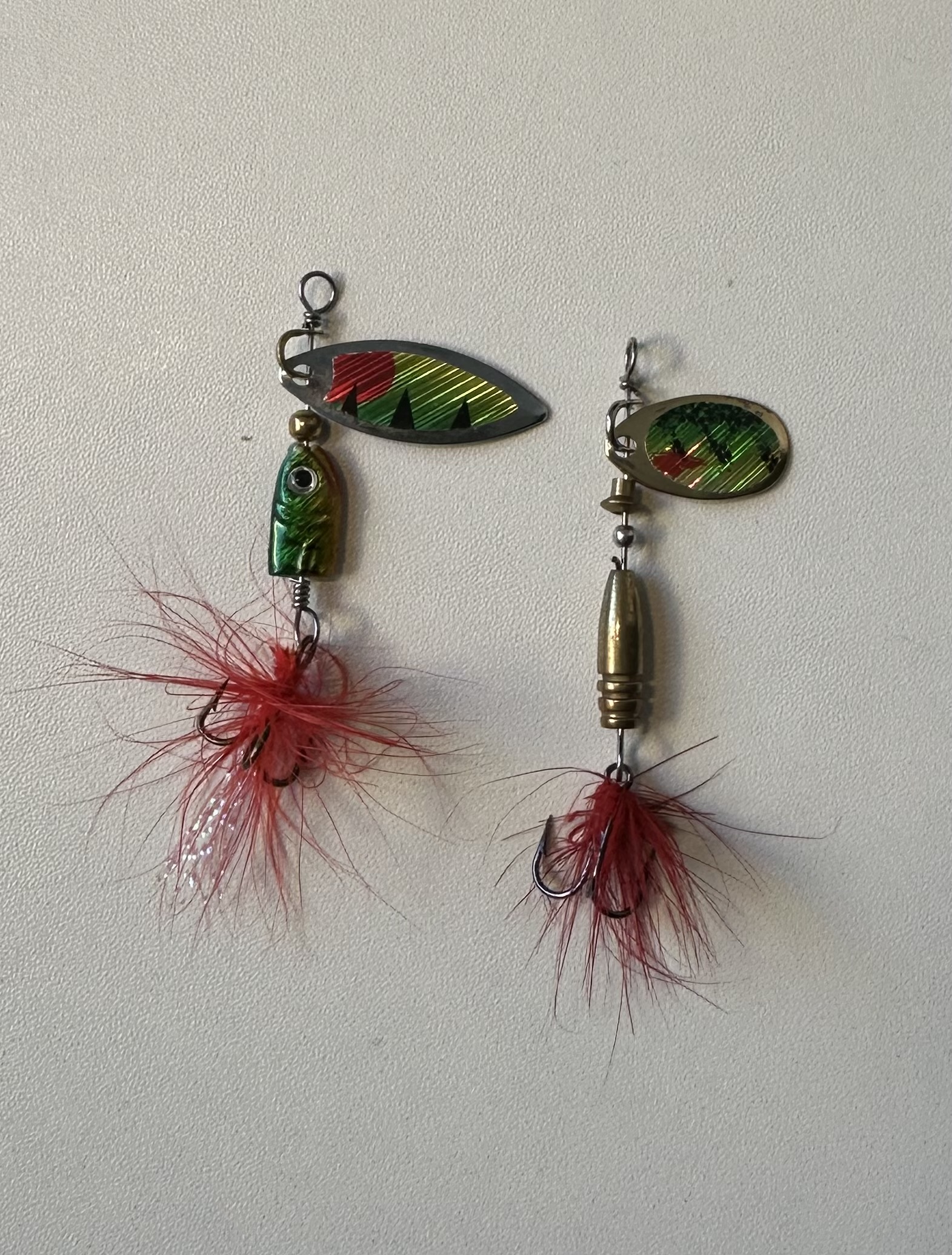 Two inline spinners with rotating metal blades along straight shafts and dressed hooks