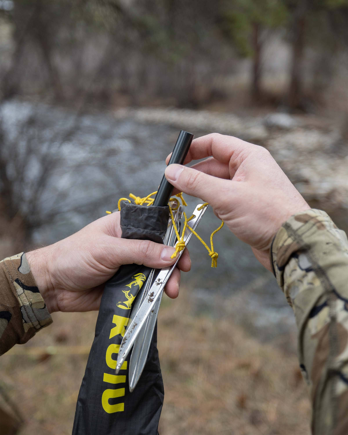 V-stakes and cords included with the KUIU Mountain Star 3P